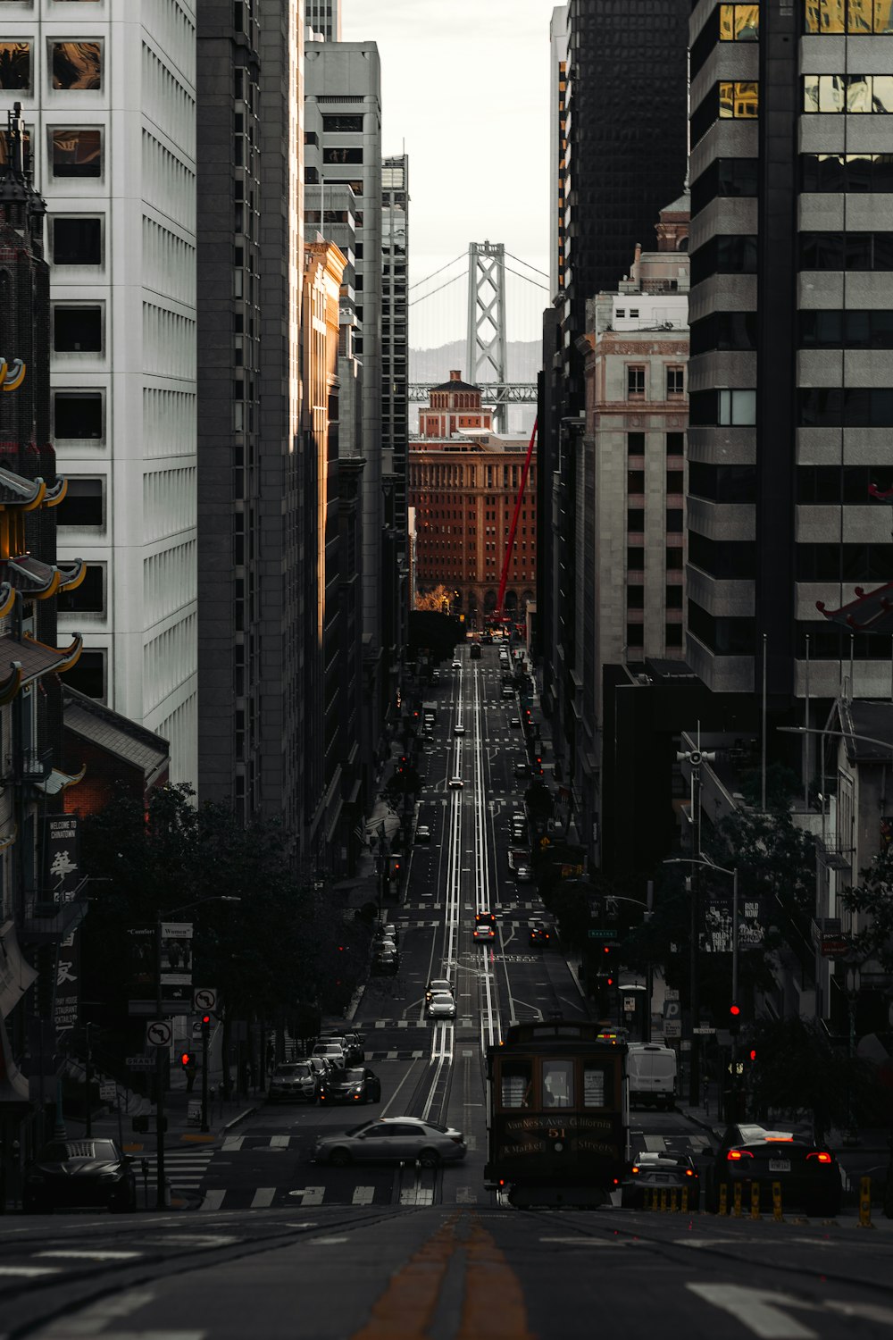 a city street filled with lots of tall buildings