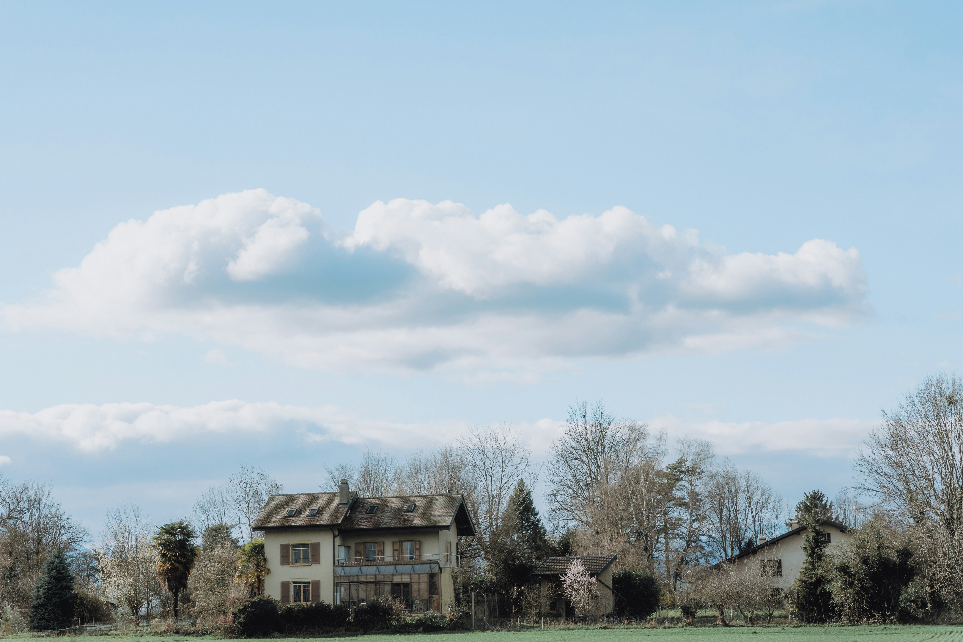 a house in the middle of a field