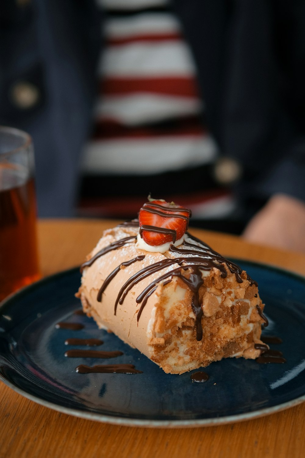 a piece of cake sitting on top of a blue plate