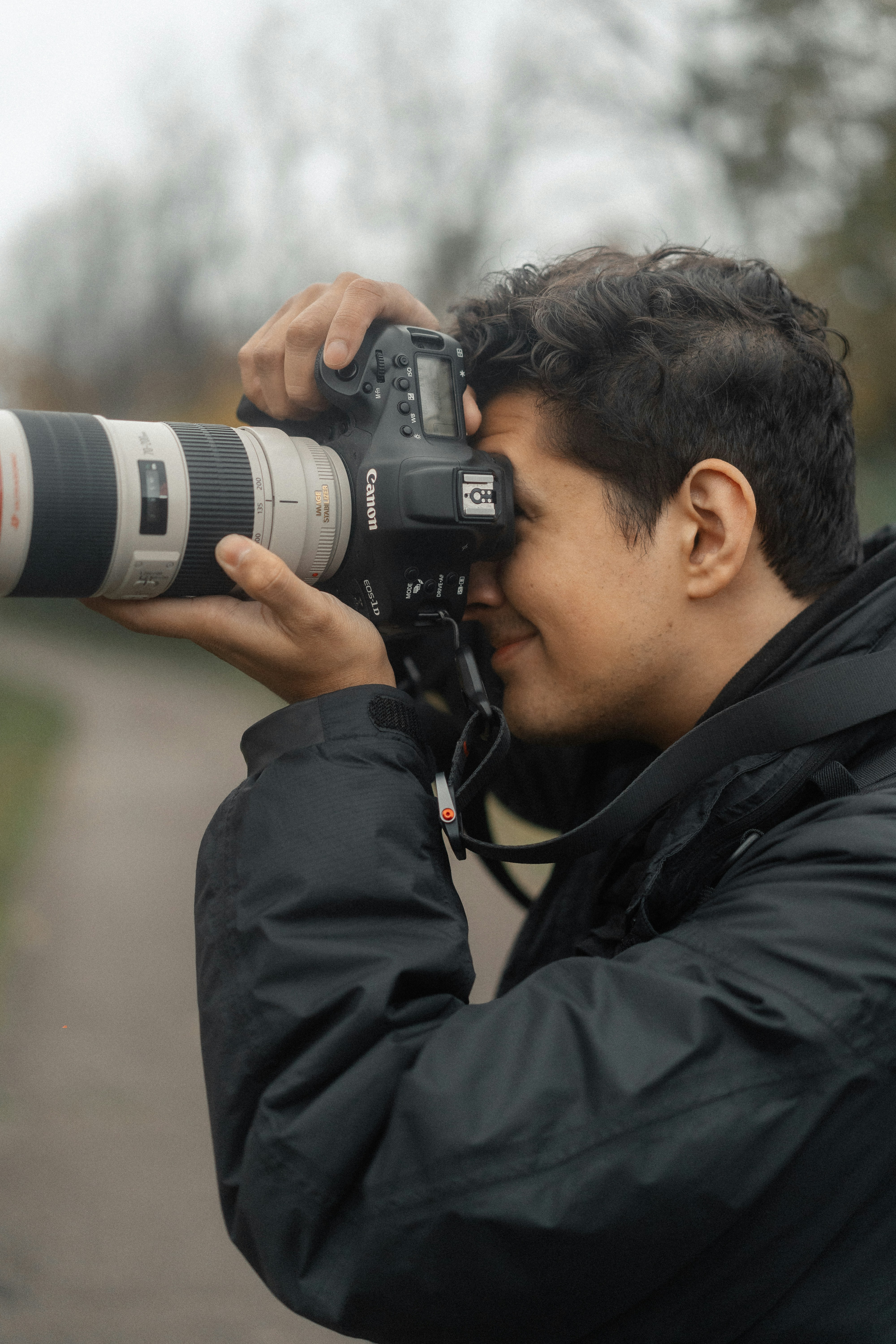 a man taking a picture with a camera