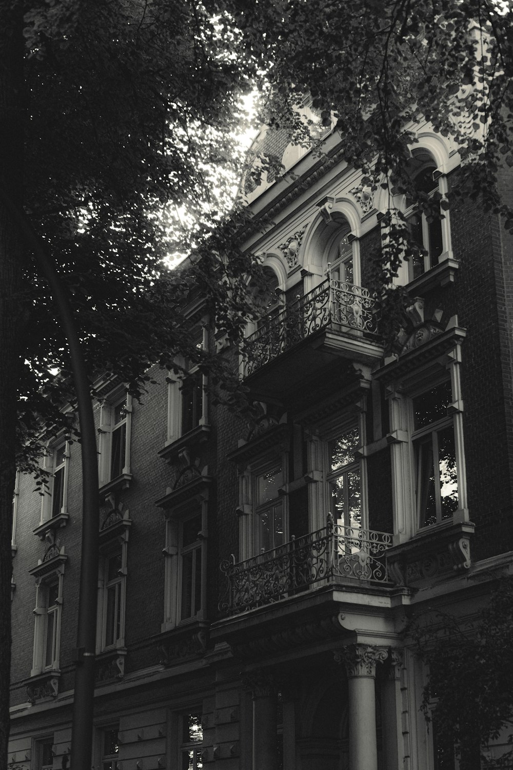 a black and white photo of a tall building