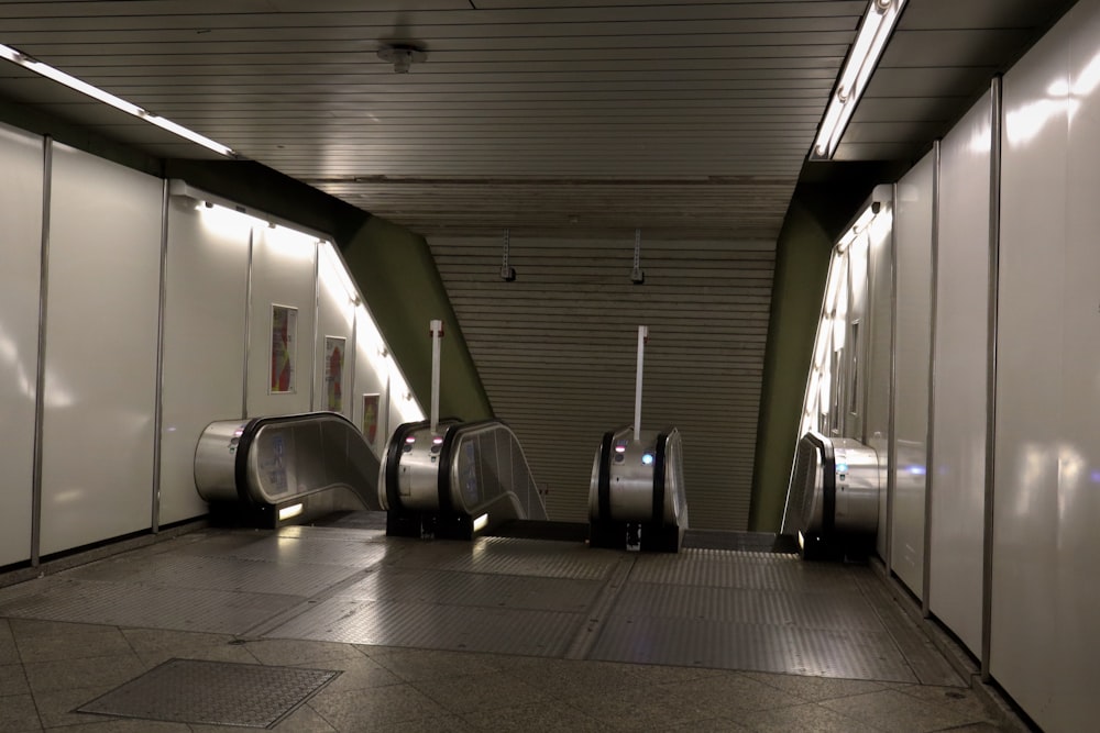 a group of escalators sitting next to each other