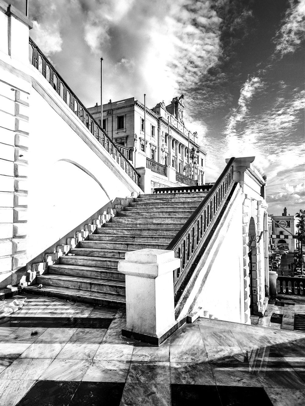 a black and white photo of a stair case