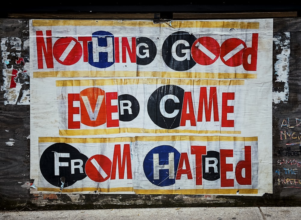 a sign on the side of a building that says nothing good ever came from gate