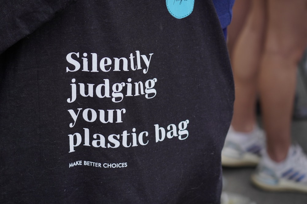 a close up of a person wearing a black shirt