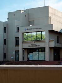 a tall building with a clock on the front of it