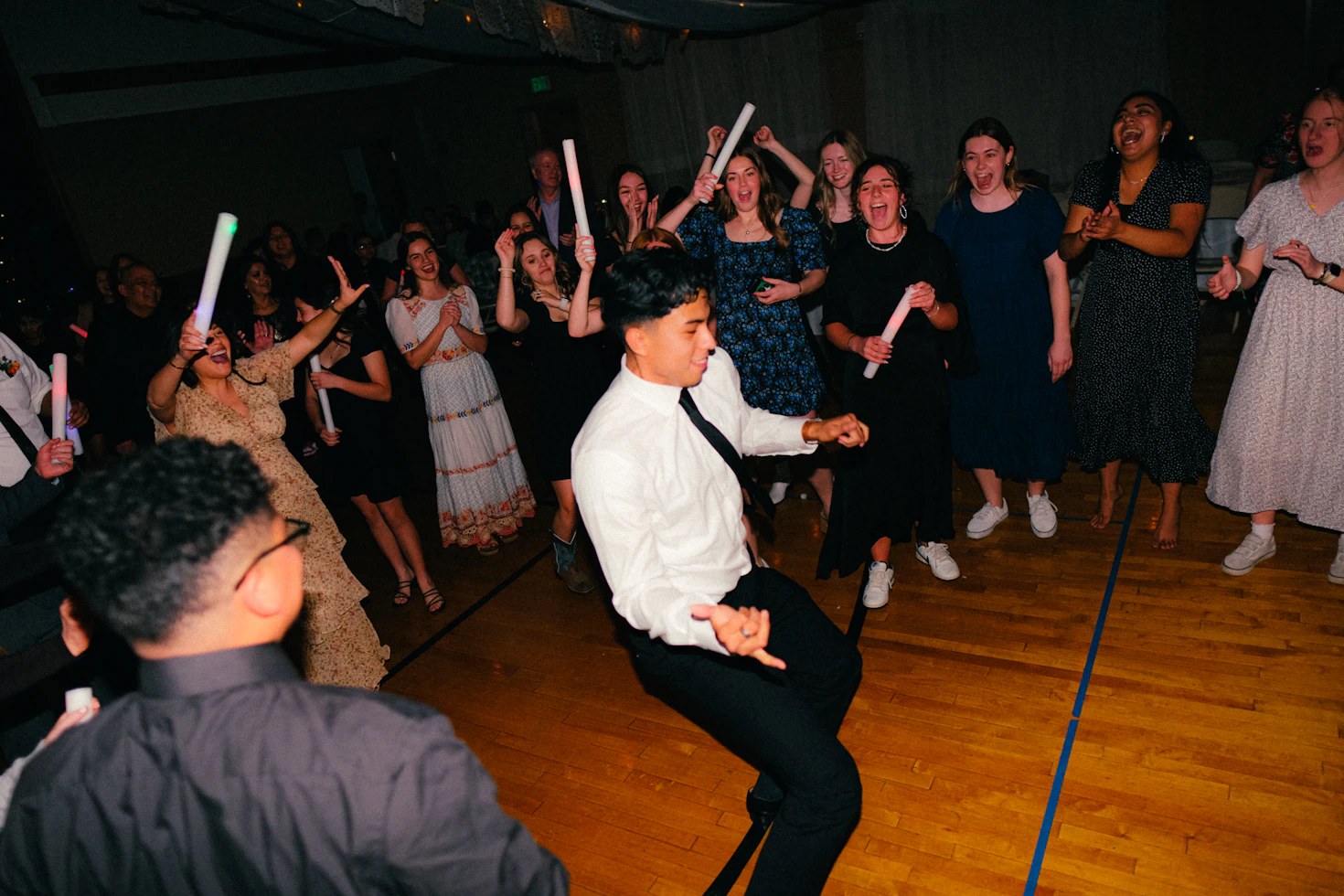 Packed dance floor at a formal celebration