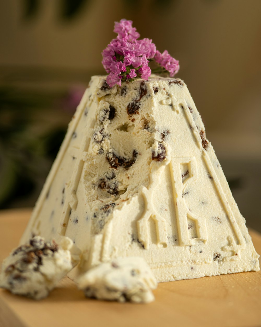 a piece of cake sitting on top of a wooden table