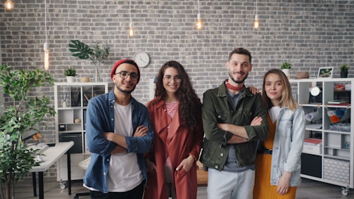 a group of people standing next to each other