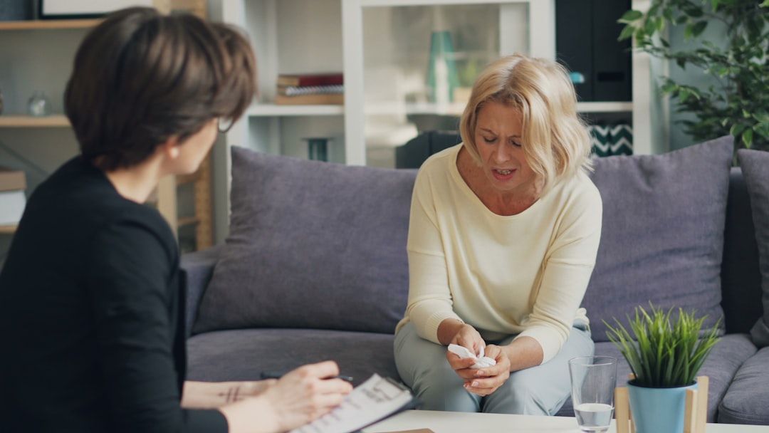 a family member warmly interviewing a potential caregiver - maid for elderly care a family member warmly interviewing a potential caregiver - maid for elderly care