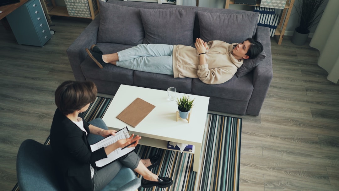 therapist and patient in cognitive behavioral therapy session