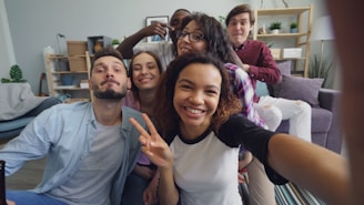 a group of people sitting on top of a couch