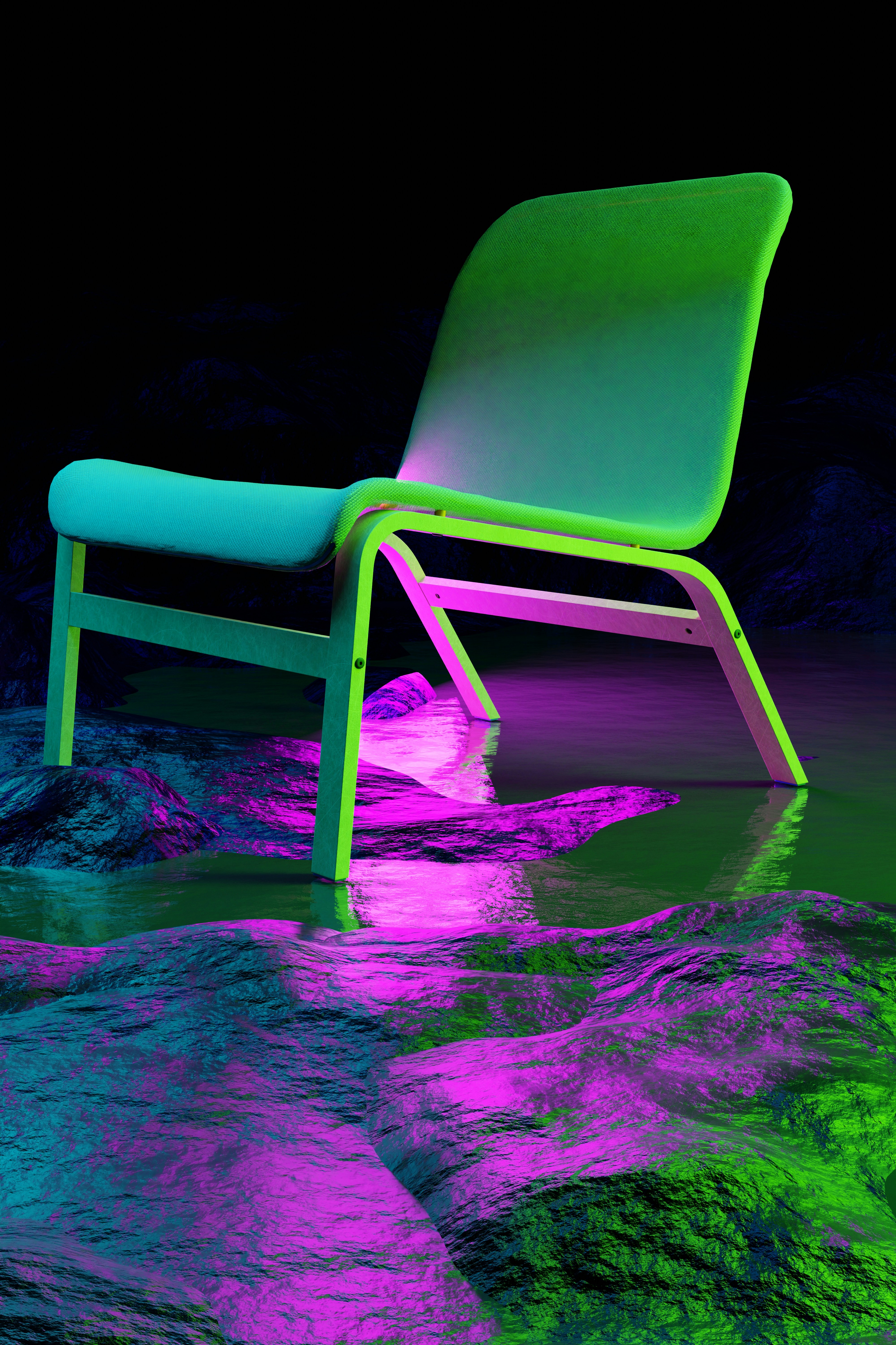 une chaise verte et bleue posée au sommet d’un rocher