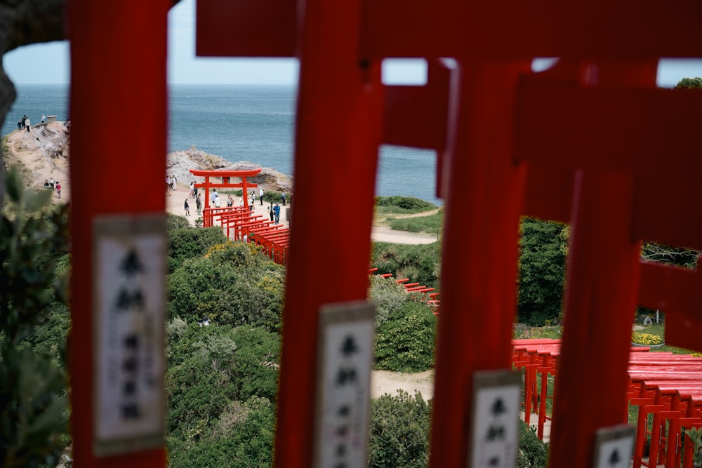 a view of a body of water from a red building