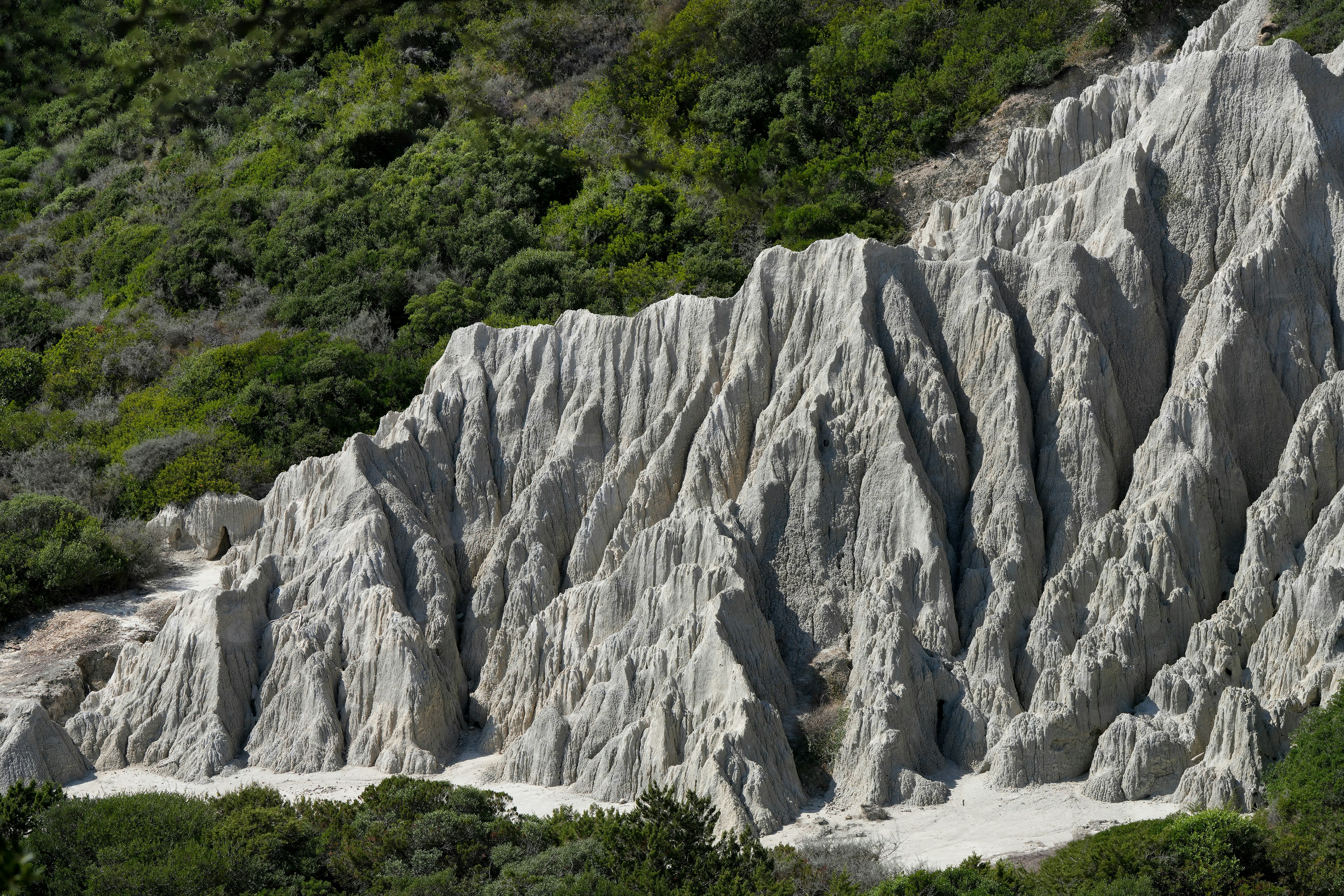 A large rock formation in the middle of a forest photo – Free Zakynthos ...