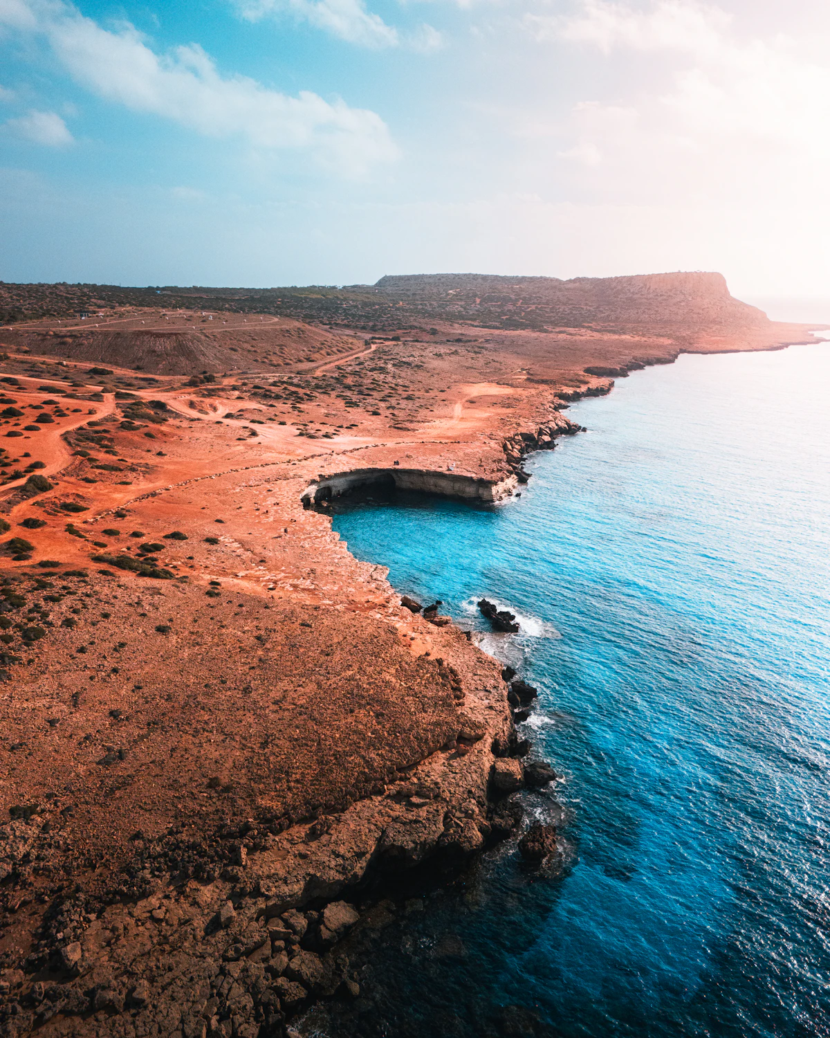 Small secluded rocky-edged bay with calm water, illustrative of Sirena Bay, between Protaras and Ayia Napa, Cyprus