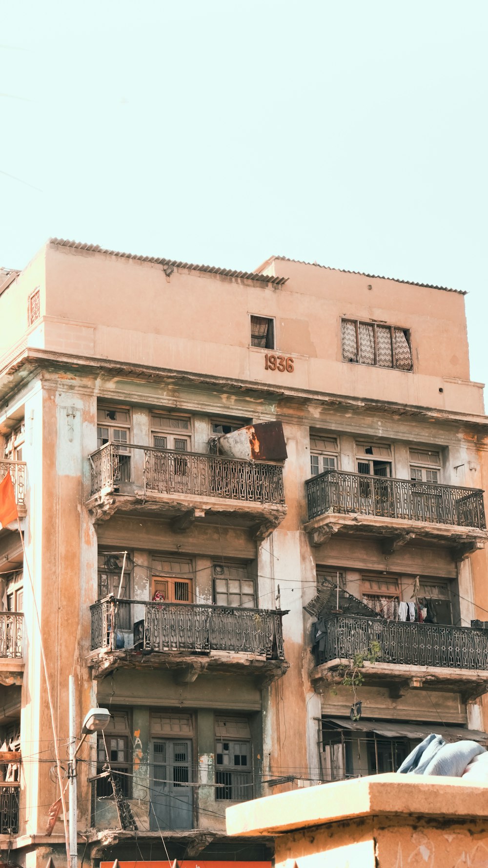 a tall building with balconies and balconies on the balconies