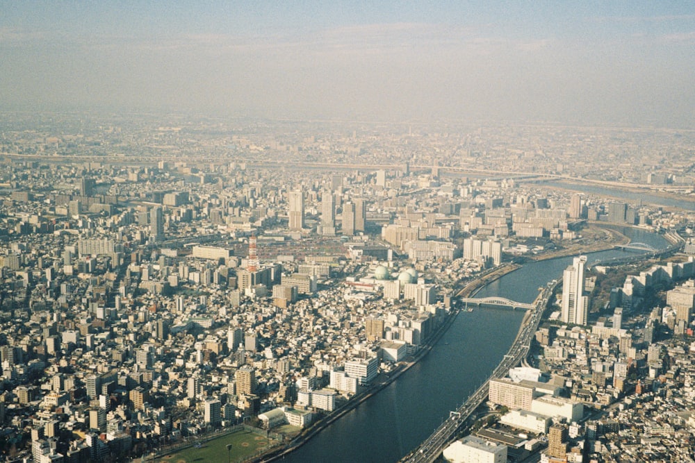an aerial view of a city and a river