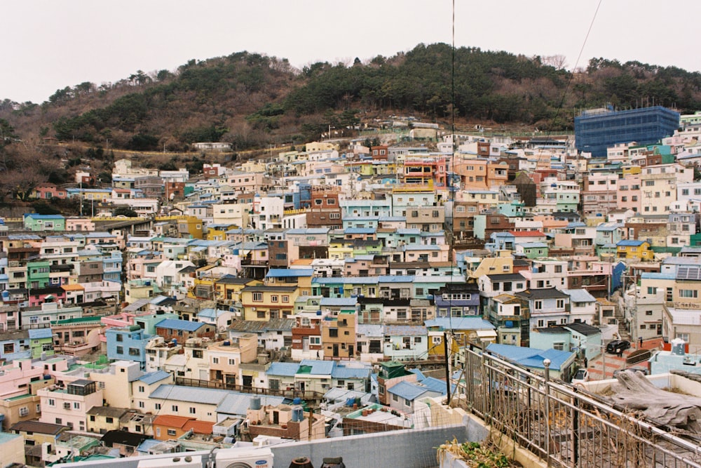 a city with lots of colorful buildings on top of it