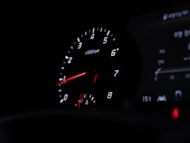 a close up of a speedometer in a car
