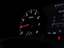 a close up of a speedometer in a car