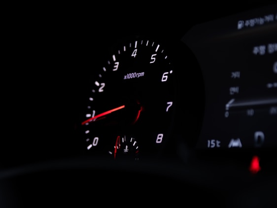 a close up of a speedometer in a car