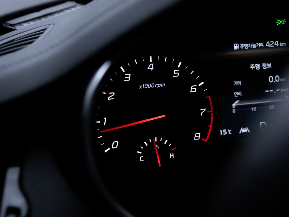 a close up of a speedometer in a vehicle