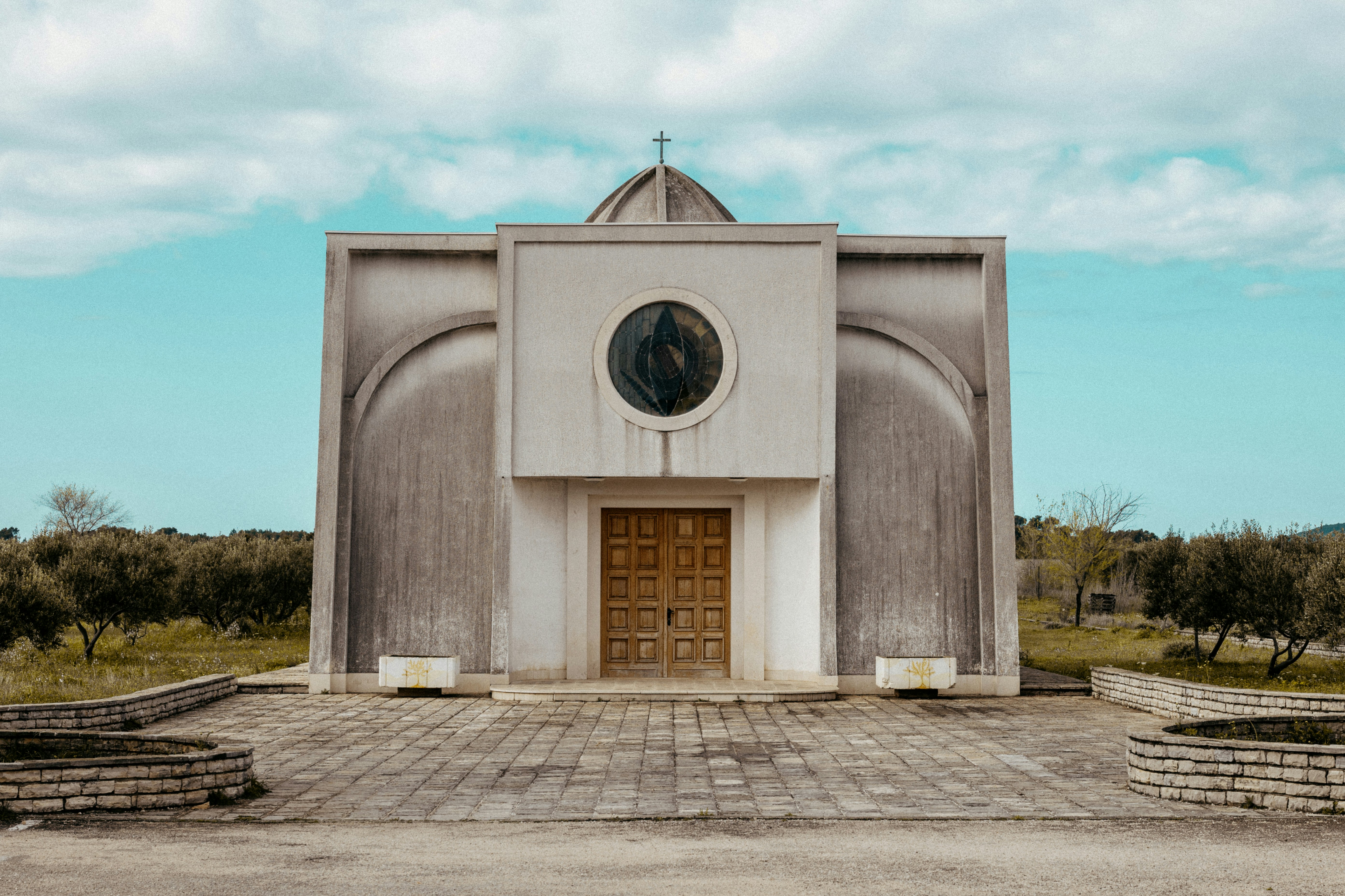 a church with a clock on the front of it