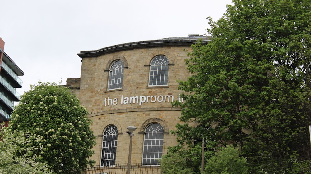 a building with a sign that says the lamp room