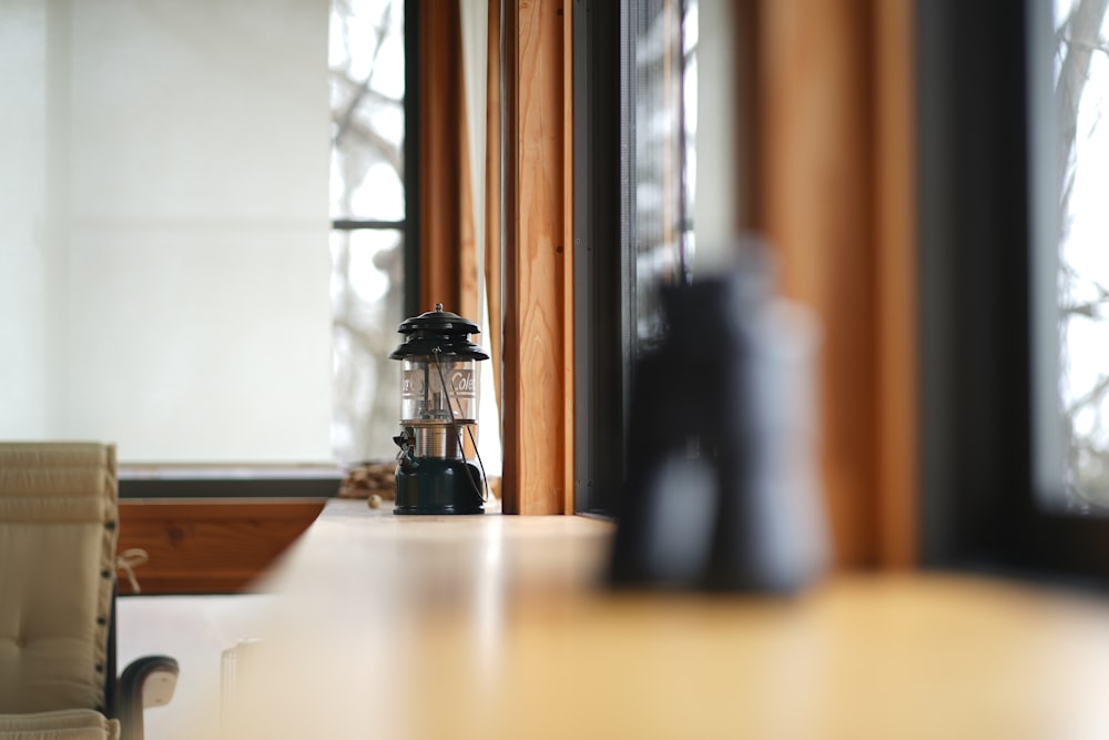 a blender sitting on top of a wooden table