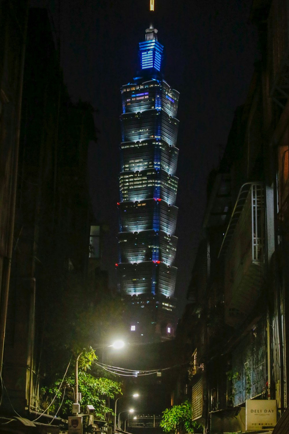 a very tall building lit up at night