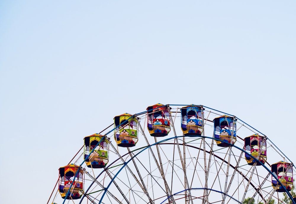 a ferris wheel with a sky background