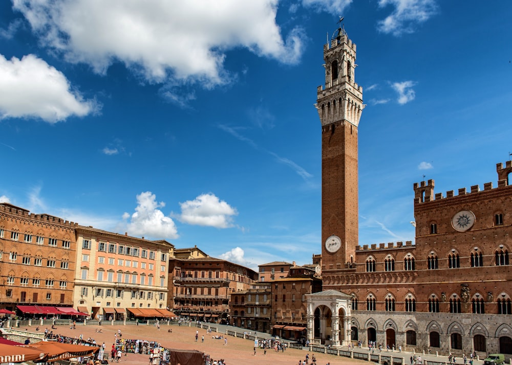 a tall clock tower towering over a city