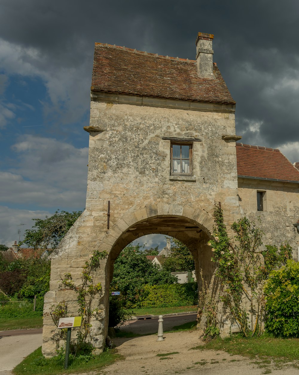 an old stone building with an arched doorway