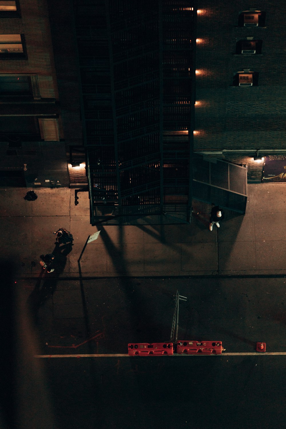 a view of a street at night from above