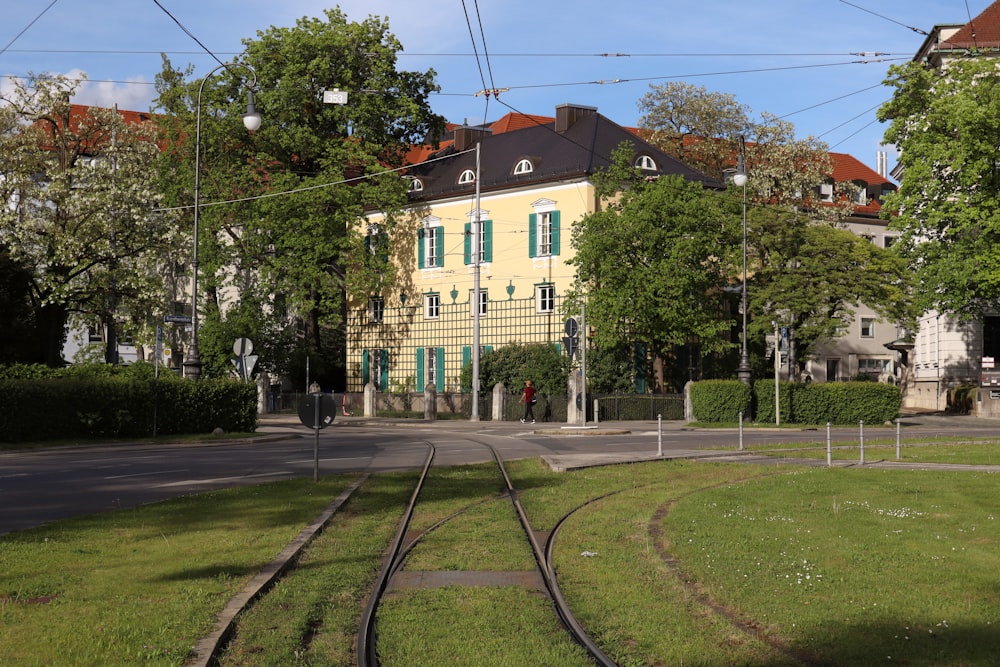 a train track running through a residential area