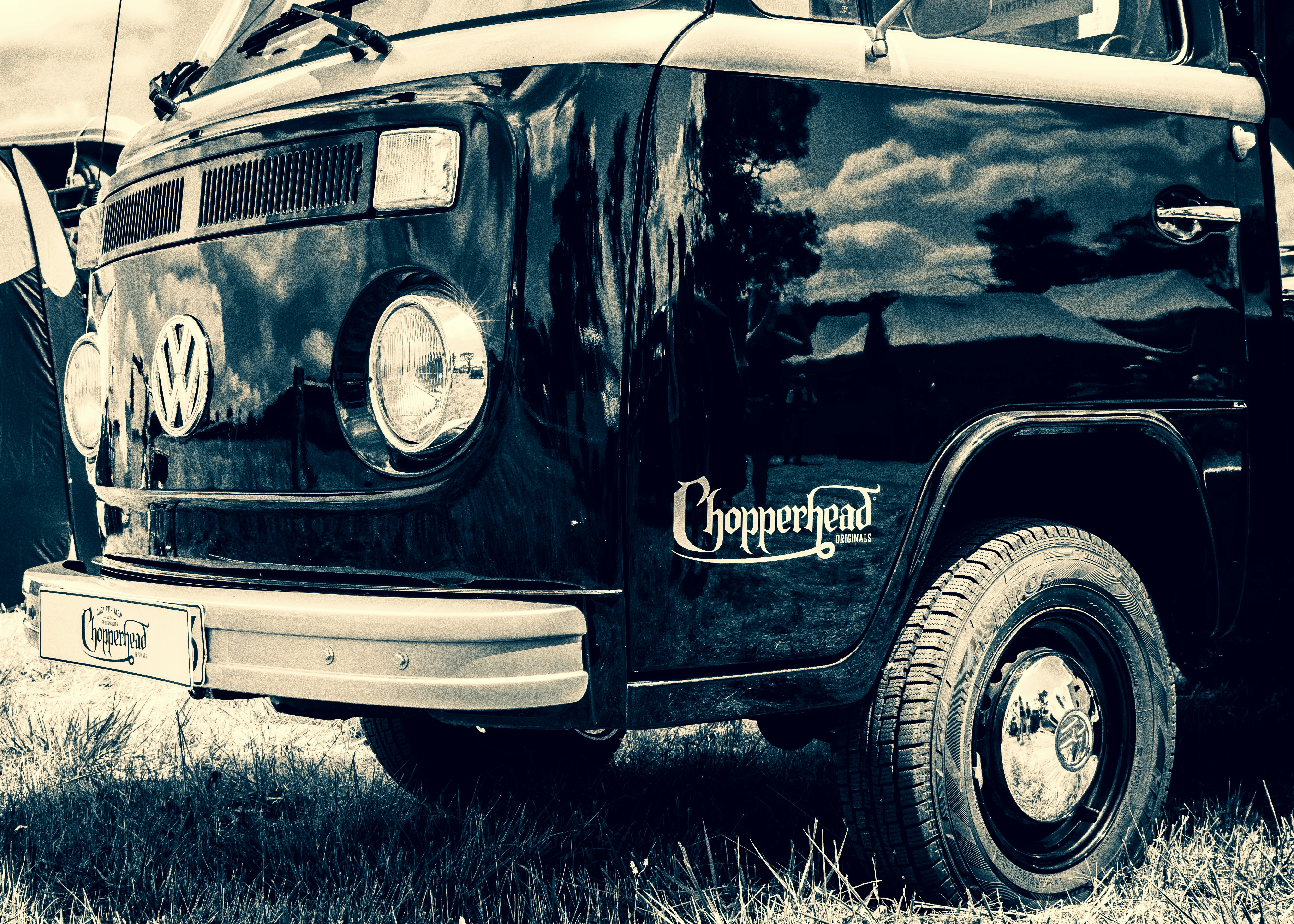 a black and white photo of an old truck