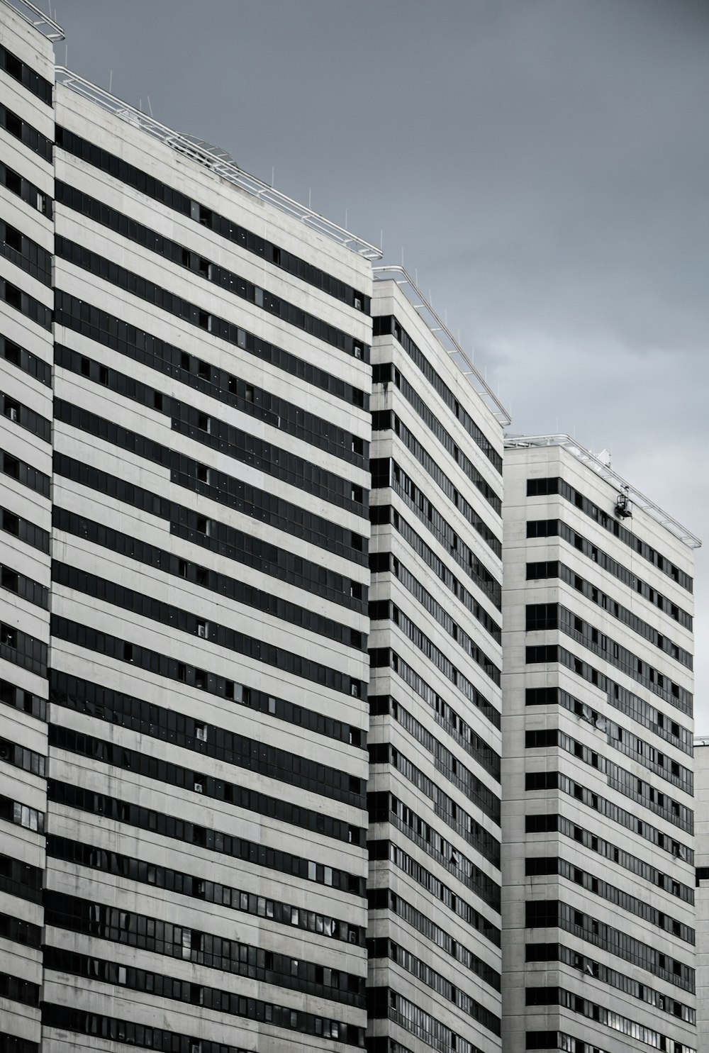 a black and white photo of a tall building