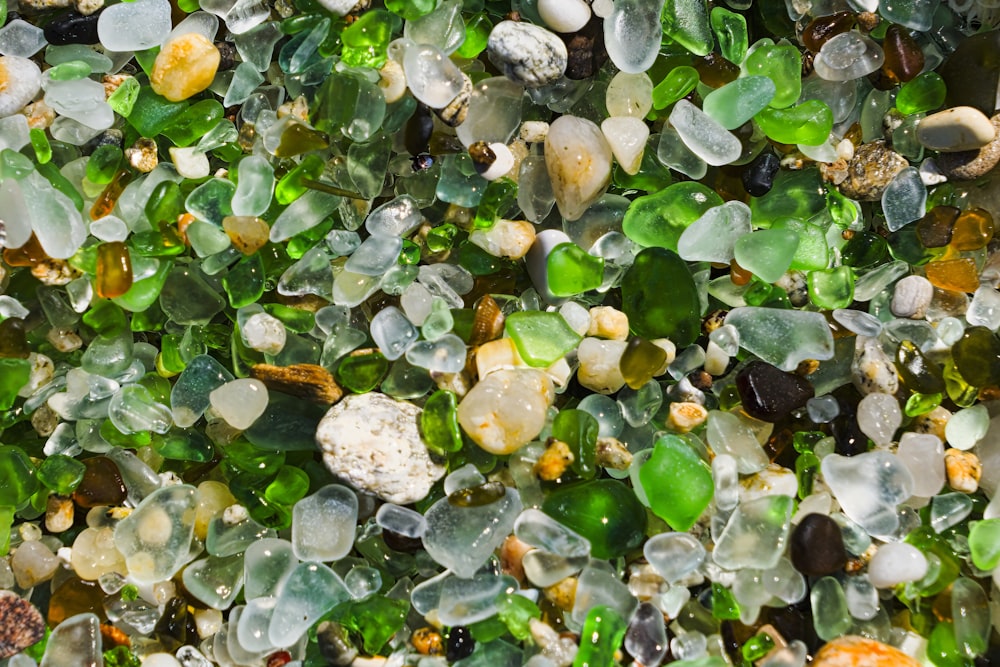 a close up of a mixture of sea glass