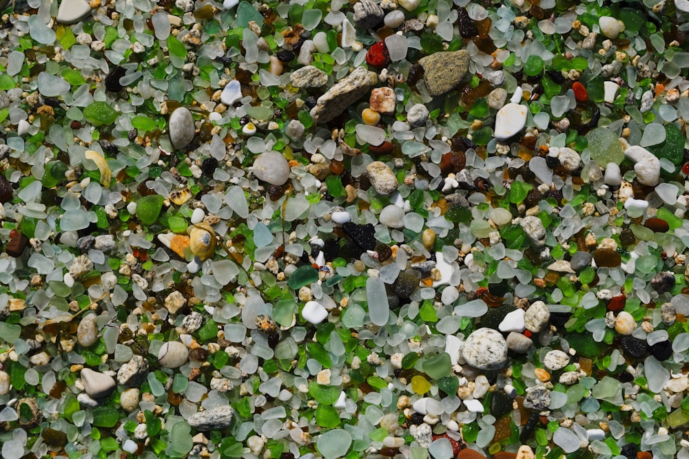 a close up of a bunch of small rocks and gravel