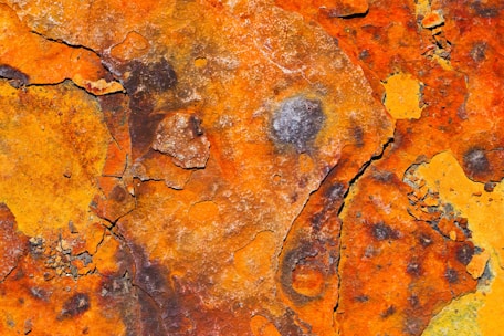 a close up of a rusted metal surface