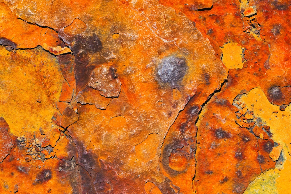 a close up of a rusted metal surface