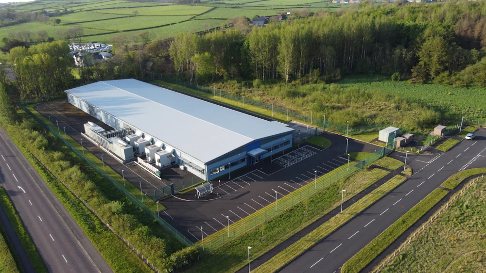 Aerial view of a data centre campus at dusk