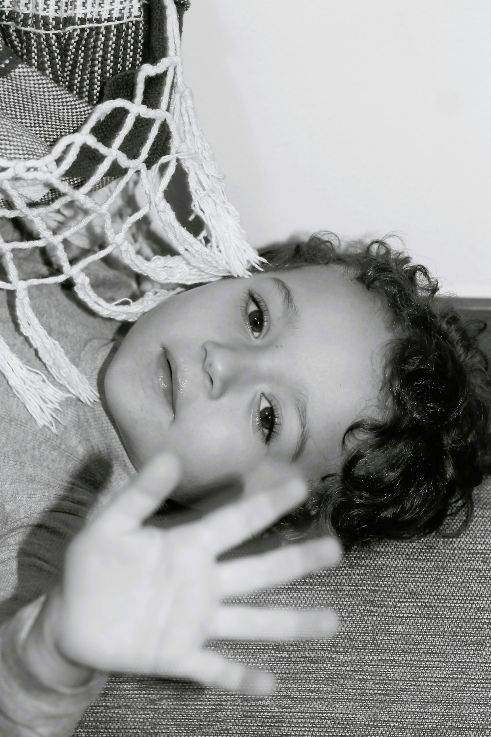 a black and white photo of a young girl