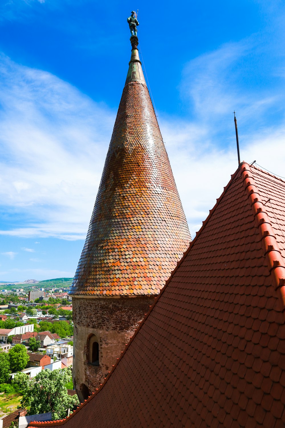 a tall tower with a clock on top of it