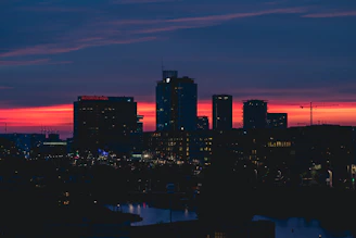 a view of a city skyline at sunset
