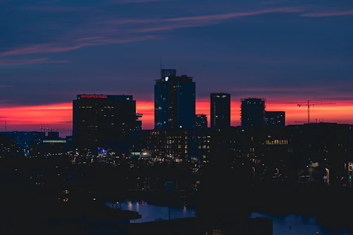 a view of a city skyline at sunset