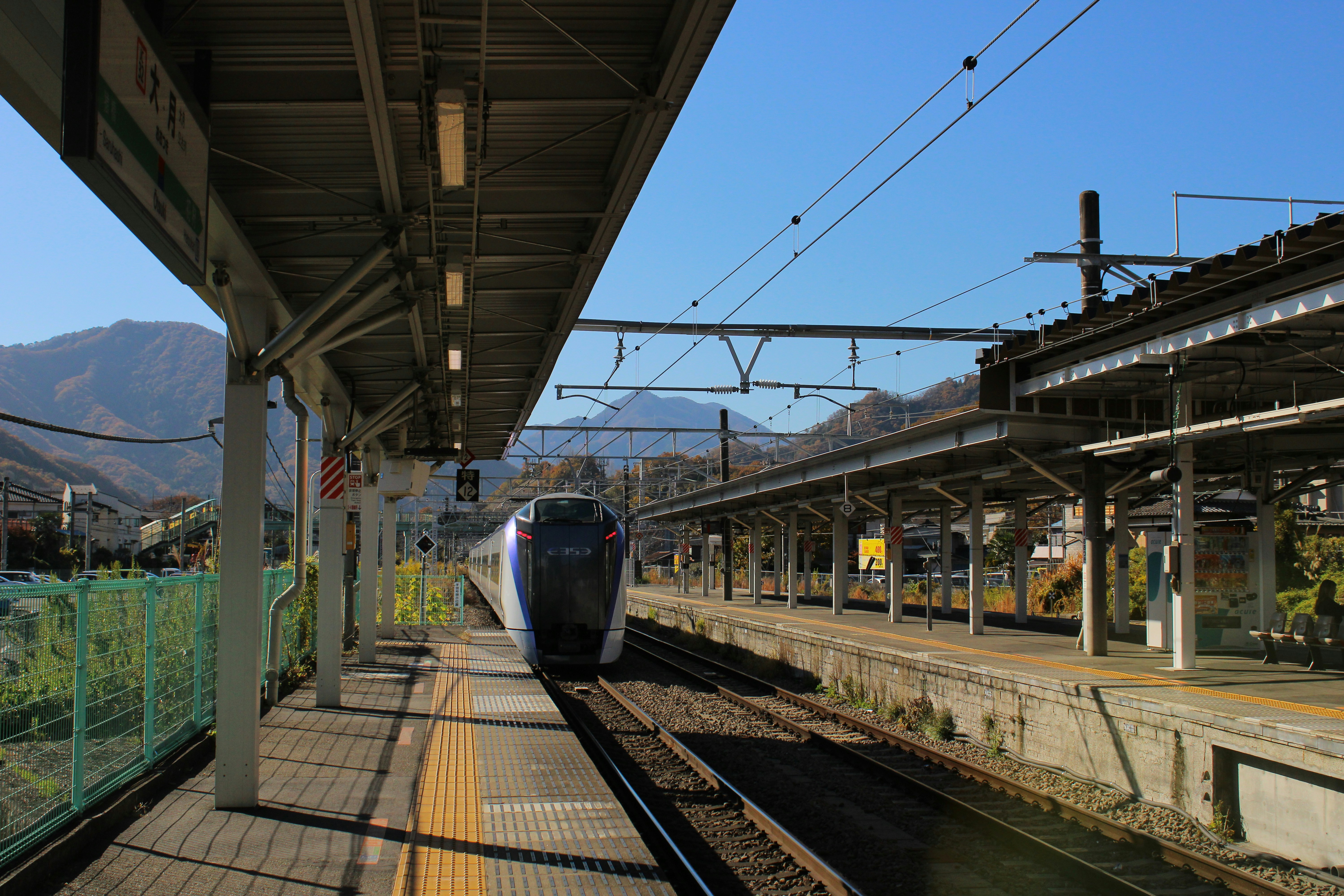 a train on the tracks at a train station