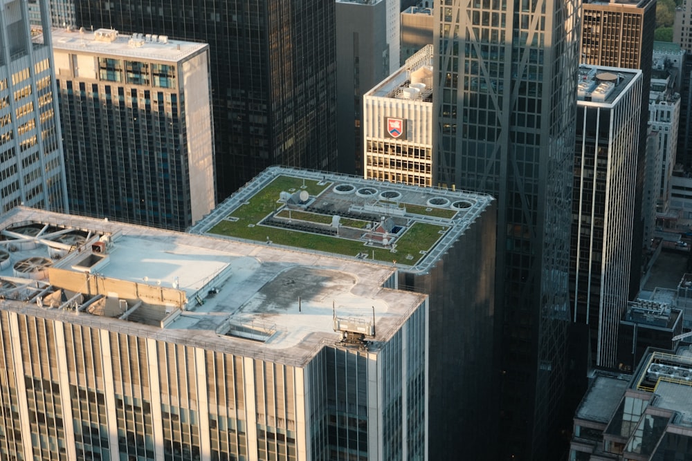 an aerial view of a city with tall buildings