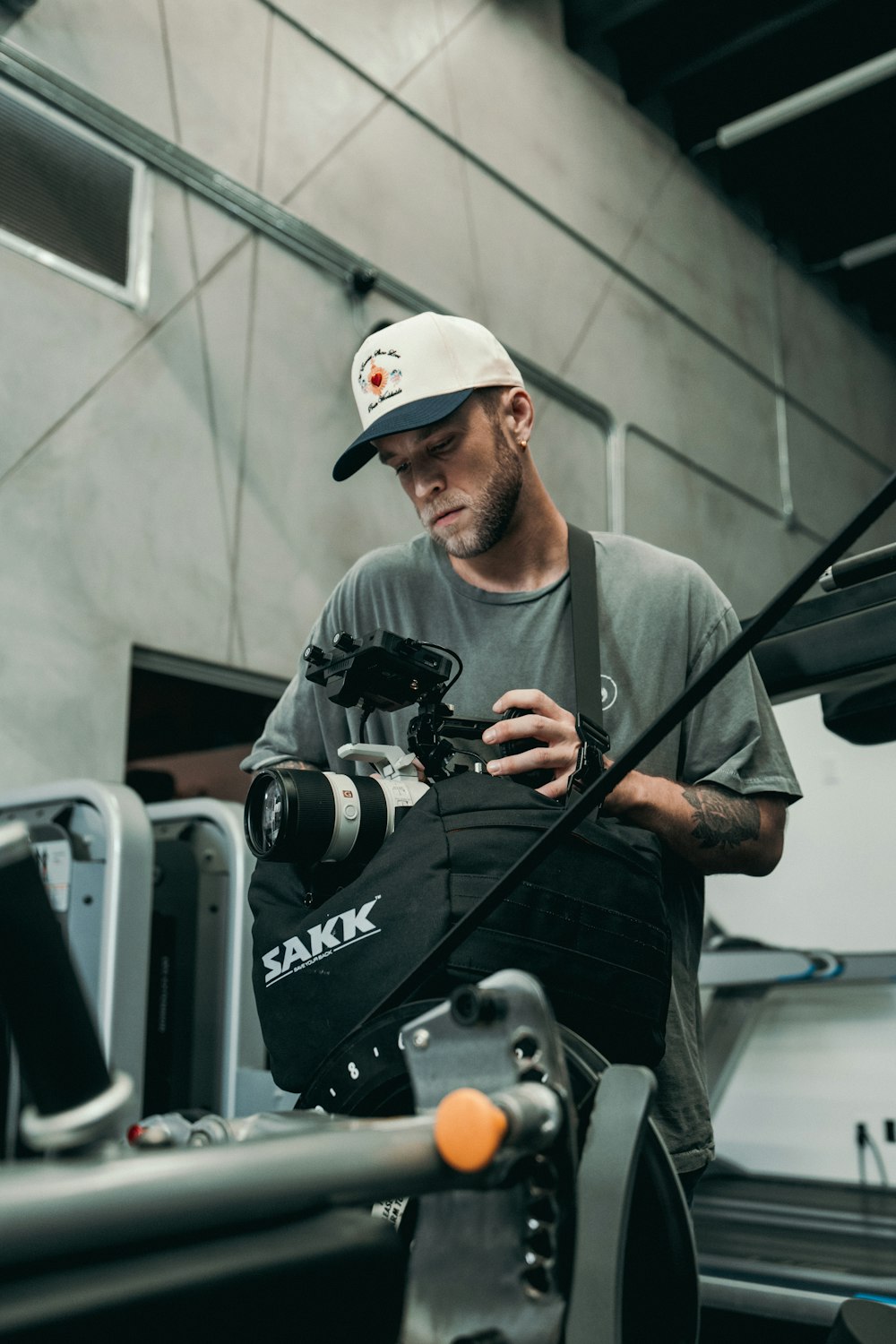 a man holding a camera in his hands